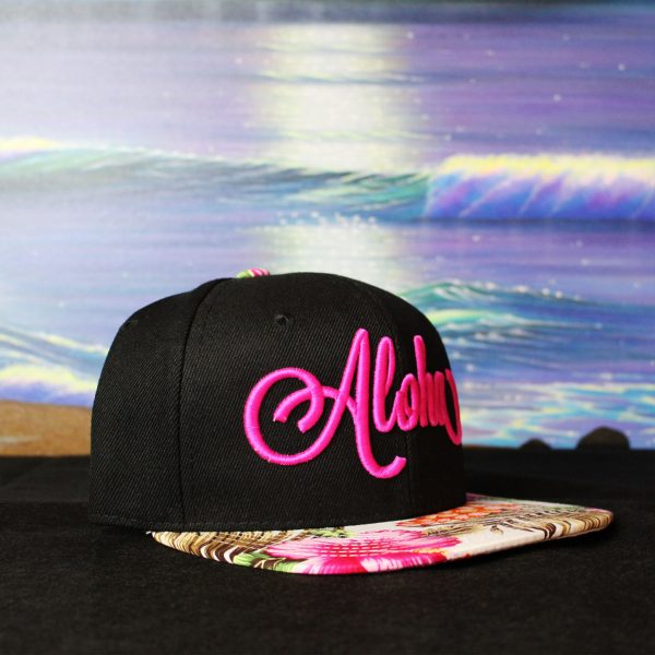 Pink Aloha embroidered on black flatbill Hat